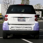 1_vehiclewrap_smartcar_anytimefitness_iconography