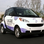 2_vehiclewrap_smartcar_anytimefitness_iconography