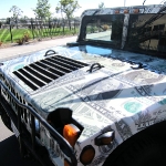 8_theonedollardifference_hummer_vehiclewrap_iconography