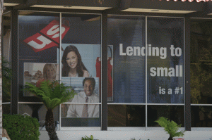 perforated window film on bank building